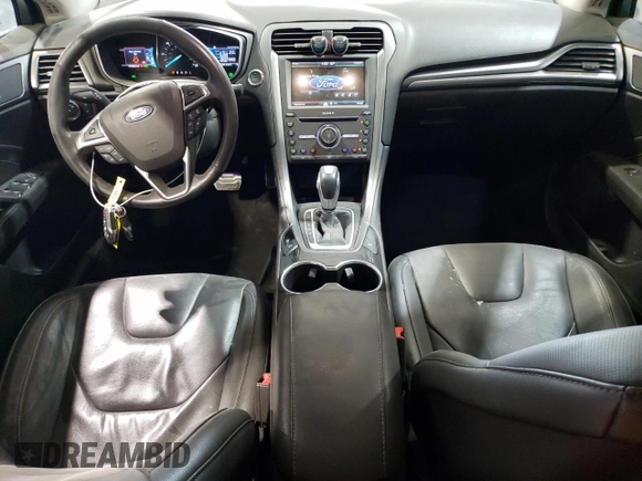 2016 Ford Fusion Titanium Hybrid with VIN 3FA6P0RUXGR355351, listed as a Copart auction lot 56516025 with 117,964 mi miles and Salvage title. Bid and sale history available at DreamBid. Image 8.