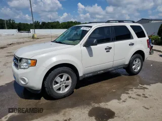 2012 Ford Escape XLT with VIN 1FMCU9D75CKC29744, listed as a Copart auction lot 64010835 with 142,579 mi miles and Salvage title. Bid and sale history available at DreamBid. Image 1.