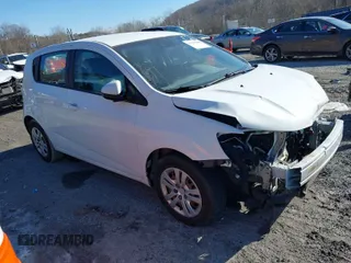 2020 Chevrolet Sonic LT with VIN 1G1JG6SB6L4110185, listed as a IAAI auction lot 41351600 with 68,813 mi miles and . Bid and sale history available at DreamBid. Image 1.