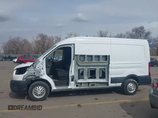 2020 Ford Transit Cargo with VIN 1FTBR2CG1LKB43034, listed as a IAAI auction lot 41668193 with 56,827 mi miles and . Bid and sale history available at DreamBid. Image 14.