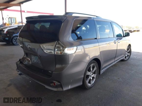 2015 Toyota Sienna SE with VIN 5TDXK3DC1FS667924, listed as a IAAI auction lot 42062805 with 123,504 mi miles. Bid and sale history available at carsss.com. Image 4.