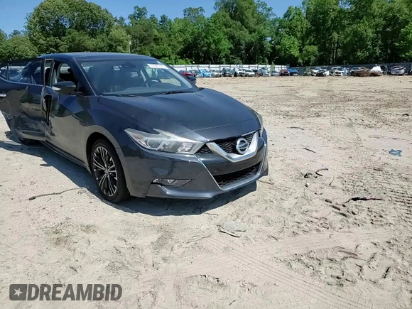 2016 Nissan Maxima SR with VIN 1N4AA6AP1GC428108, listed as a Copart auction lot 57221335 with 90,473 mi miles and Salvage title. Bid and sale history available at DreamBid. Image 14.