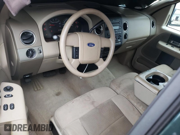 2005 Ford F-150 XL with VIN 1FTPF12585NA63952, listed as a Copart auction lot 74300474 with 98,379 mi miles and Salvage Title. Bid and sale history available at carsss.com. Image 8.