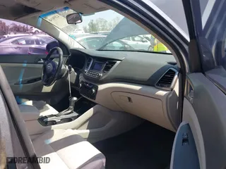 2017 Hyundai Tucson Value with VIN KM8J33A26HU385271, listed as a IAAI auction lot 42090148 with 95,170 mi miles. Bid and sale history available at carsss.com. Image 5.
