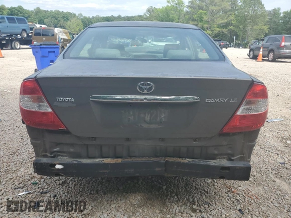 2004 Toyota Camry LE z VIN 4T1BE32K74U848946, wystawiony jako Copart lot #56030995 z przebiegiem Nie podano mil oraz Szkoda całkowita • Salvage title. Historia ofert i sprzedaży dostępna na DreamBid. Obrazek 6.