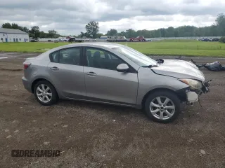 2011 Mazda 3 i Touring with VIN JM1BL1VF3B1491700, listed as a Copart auction lot 61573885 with 145,626 mi miles and Salvage title. Bid and sale history available at DreamBid. Image 4.
