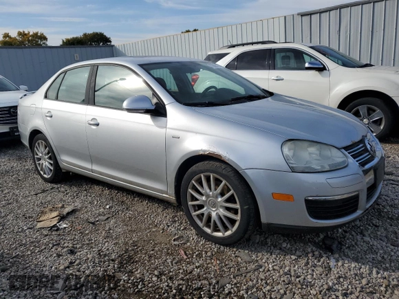 2008 Volkswagen Jetta Wolfsburg Edition z VIN 3VWRJ71K98M189900, wystawiony jako Copart lot #77866404 z przebiegiem 143 209 mil mil oraz Czysty tytuł • Clean title. Historia ofert i sprzedaży dostępna na DreamBid. Obrazek 4.