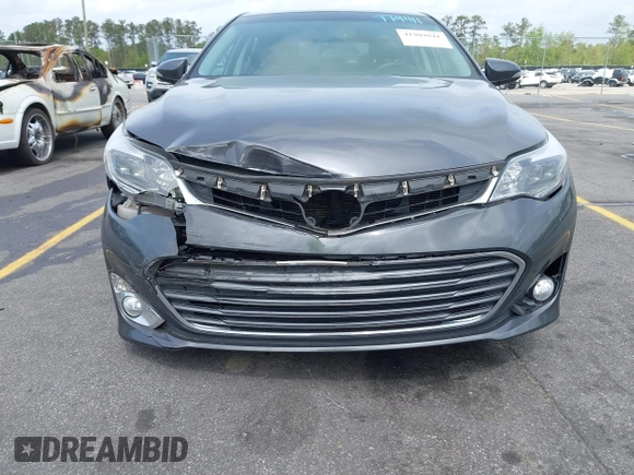 2013 Toyota Avalon XLE with VIN 4T1BK1EB8DU019702, listed as a IAAI auction lot 41909041 with 79,819 mi miles and . Bid and sale history available at DreamBid. Image 6.