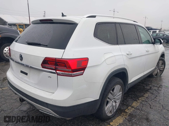 2019 Volkswagen Atlas SE z VIN 1V2WR2CA8KC504134, wystawiony jako IAAI lot #41700050 z przebiegiem 97 047 mil mil oraz . Historia ofert i sprzedaży dostępna na DreamBid. Obrazek 4.