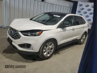 2021 Ford Edge Titanium with VIN 2FMPK4K96MBA27411, listed as a Copart auction lot 62106405 with 84,919 mi miles and Clean title. Bid and sale history available at DreamBid. Image 1.