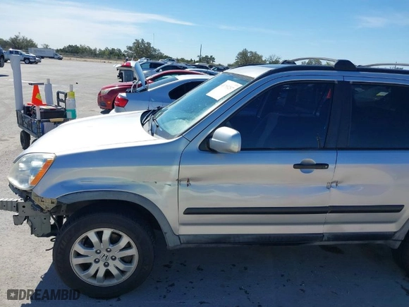 2005 Honda CR-V EX with VIN JHLRD78885C035912, listed as a IAAI auction lot 41793257 with 211,694 mi miles. Bid and sale history available at carsss.com. Image 12.