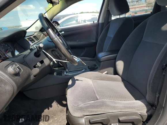 2014 Chevrolet Impala LS with VIN 2G1WA5E36E1183755, listed as a Copart auction lot 52616585 with 144,258 mi miles and Salvage Title. Bid and sale history available at DreamBid. Image 7.