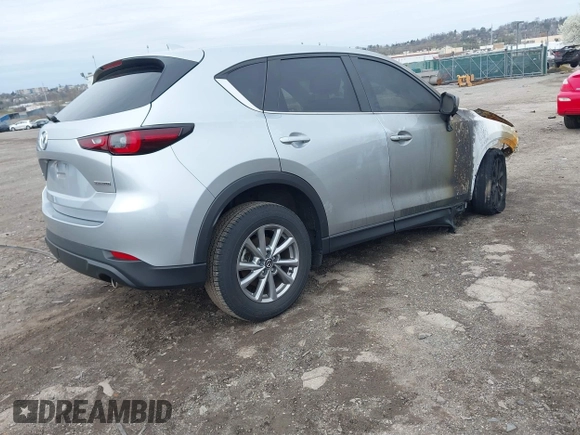 2023 Mazda CX-5 S Carbon Edition z VIN JM3KFBCMXP0265141, wystawiony jako IAAI lot #41946750 z przebiegiem Nie podano mil oraz . Historia ofert i sprzedaży dostępna na DreamBid. Obrazek 4.