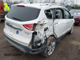 2016 Ford Escape Titanium with VIN 1FMCU9J94GUC22994, listed as a IAAI auction lot 42010816 with 80,293 mi miles. Bid and sale history available at carsss.com. Image 4.