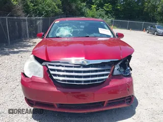 2010 Chrysler Sebring Limited with VIN 1C3CC5FB8AN133656, listed as a IAAI auction lot 42561161 with 145,785 mi miles and . Bid and sale history available at DreamBid. Image 12.