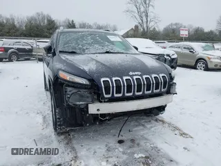 2014 Jeep Cherokee Altitude with VIN 1C4PJMCB9EW187288, listed as a IAAI auction lot 41320161 with 169,534 mi miles and . Bid and sale history available at DreamBid. Image 6.