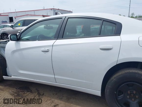 2014 Dodge Charger Police with VIN 2C3CDXAT8EH216267, listed as a IAAI auction lot 42104131 with 116,299 mi miles and . Bid and sale history available at DreamBid. Image 14.