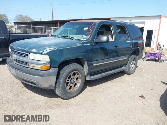 2004 Chevrolet Tahoe LS z VIN 1GNEC13V74J307523, wystawiony jako IAAI lot #41820407 z przebiegiem 237 728 mil mil oraz . Historia ofert i sprzedaży dostępna na DreamBid. Obrazek 2.