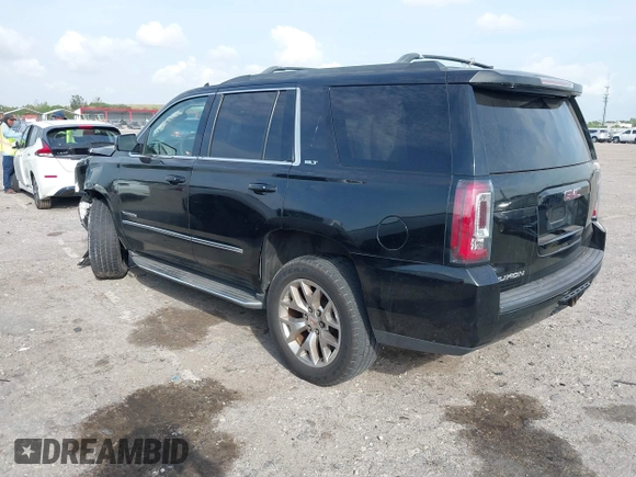 2015 GMC Yukon SLT with VIN 1GKS1BKC1FR539194, listed as a IAAI auction lot 41864424 with 1 mi miles. Bid and sale history available at carsss.com. Image 3.