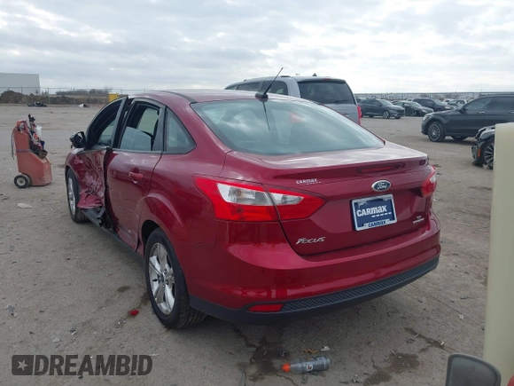 2014 Ford Focus SE with VIN 1FADP3F21EL340728, listed as a IAAI auction lot 41159162 with 125,919 mi miles. Bid and sale history available at carsss.com. Image 3.