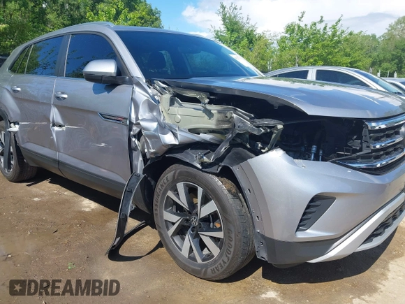 2023 Volkswagen Atlas SE с VIN 1V2LC2CA9PC212519, выставлен на аукционе IAAI как лот 42177771 с пробегом 58 505 миль миль и . История ставок и продаж доступна на DreamBid. Изображение 6.