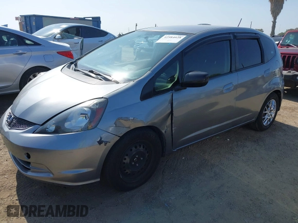 2009 Honda Fit with VIN JHMGE88239S025012, listed as a IAAI auction lot 42584028 with 163,965 mi miles and . Bid and sale history available at DreamBid. Image 2.