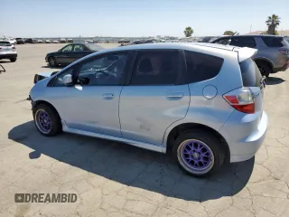 2010 Honda Fit Sport with VIN JHMGE8H49AC011812, listed as a Copart auction lot 60341615 with 187,428 mi miles and Salvage title. Bid and sale history available at DreamBid. Image 2.