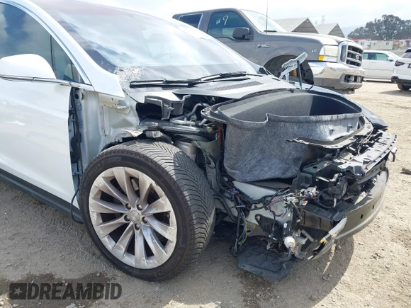 2020 Tesla Model X Long Range with VIN 5YJXCDE26LF238982, listed as a IAAI auction lot 42100220 with 44,804 mi miles. Bid and sale history available at carsss.com. Image 20.