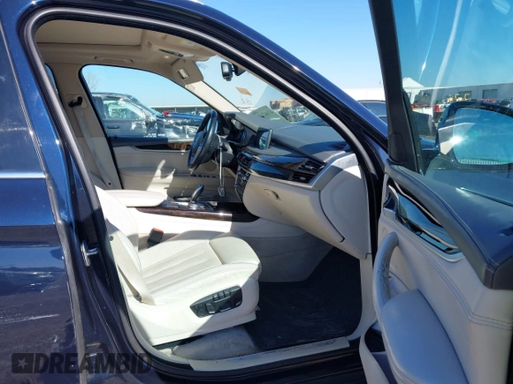 2016 BMW X5 sDrive35i with VIN 5UXKR2C55G0R71330, listed as a IAAI auction lot 41661140 with 128,457 mi miles. Bid and sale history available at carsss.com. Image 5.
