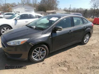 2015 Ford Focus SE with VIN 1FADP3F28FL292520, listed as a IAAI auction lot 41906723 with 74,106 mi miles. Bid and sale history available at carsss.com. Image 2.