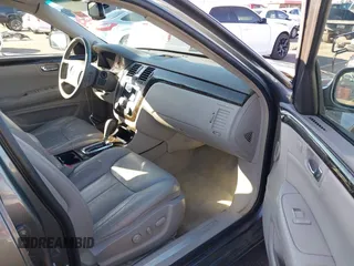 2008 Cadillac DTS 1SA z VIN 1G6KD57Y08U186328, wystawiony jako IAAI lot #41618974 z przebiegiem 71 920 mil mil oraz . Historia ofert i sprzedaży dostępna na DreamBid. Obrazek 5.