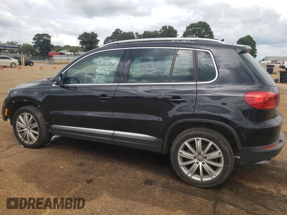 2014 Volkswagen Tiguan SEL with VIN WVGAV3AX5EW558929, listed as a Copart auction lot 71004684 with 125,628 mi miles and Clean title. Bid and sale history available at DreamBid. Image 2.