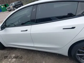 2021 Tesla Model 3 Long Range z VIN 5YJ3E1EB9MF014985, wystawiony jako IAAI lot #41672208 z przebiegiem 52 222 mil mil oraz . Historia ofert i sprzedaży dostępna na DreamBid. Obrazek 14.
