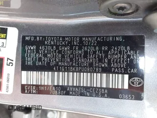 2023 Toyota Camry SE z VIN 4T1G11BK8PU080789, wystawiony jako IAAI lot #41706858 z przebiegiem 48 052 mil mil oraz . Historia ofert i sprzedaży dostępna na DreamBid. Obrazek 9.
