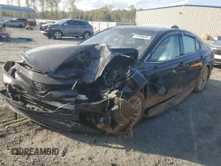 2019 Toyota Camry Hybrid LE z VIN 4T1B21HK2KU519539, wystawiony jako Copart lot #51830045 z przebiegiem Nie podano mil oraz Szkoda całkowita • Salvage title. Historia ofert i sprzedaży dostępna na DreamBid. Obrazek 1.