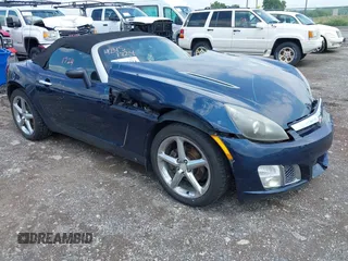 2007 Saturn Sky Red Line z VIN 1G8MG35X87Y130568, wystawiony jako IAAI lot #42451724 z przebiegiem 166 744 mil mil oraz . Historia ofert i sprzedaży dostępna na DreamBid. Obrazek 1.