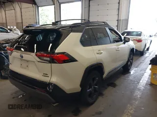2021 Toyota RAV4 Hybrid XSE with VIN 4T3E6RFV8MU046348, listed as a IAAI auction lot 40520896 with 53,312 mi miles and . Bid and sale history available at DreamBid. Image 4.