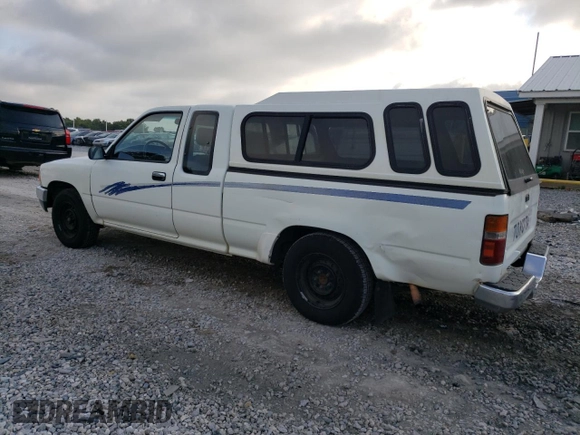 1993 Toyota Pickup DLX z VIN JT4RN93P7P5074129, wystawiony jako Copart lot #72893054 z przebiegiem 235 053 mil mil oraz Szkoda całkowita • Salvage title. Historia ofert i sprzedaży dostępna na DreamBid. Obrazek 2.