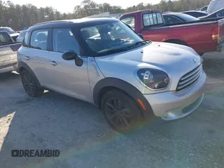 2014 MINI Countryman with VIN WMWZB3C55EWR38359, listed as a IAAI auction lot 41419574 with 158,292 mi miles and . Bid and sale history available at DreamBid. Image 1.