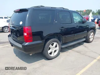 2007 Chevrolet Tahoe LTZ with VIN 1GNFC13007R111180, listed as a IAAI auction lot 42381749 with 126,472 mi miles and . Bid and sale history available at DreamBid. Image 4.
