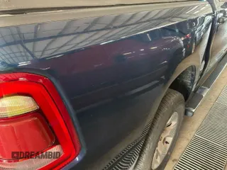 2023 Ram 1500 Big Horn with VIN 1C6RRFFG7PN561014, listed as a IAAI auction lot 42836551 with 24,934 mi miles and . Bid and sale history available at DreamBid. Image 6.
