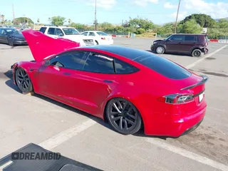 2022 Tesla Model S Plaid with VIN 5YJSA1E61NF460253, listed as a IAAI auction lot 40328727 with Not provided miles and . Bid and sale history available at DreamBid. Image 3.