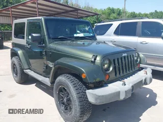 2008 Jeep Wrangler Sahara z VIN 1J4FA54108L594083, wystawiony jako IAAI lot #42247990 z przebiegiem 139 397 mil mil oraz . Historia ofert i sprzedaży dostępna na DreamBid. Obrazek 1.