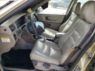 1999 Volvo V70 with VIN YV1LW55A2X2555888, listed as a Copart auction lot 58222784 with 205,133 mi miles and Salvage title. Bid and sale history available at DreamBid. Image 7.