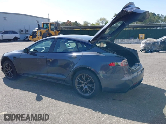 2021 Tesla Model S Plaid with VIN 5YJSA1E66MF456357, listed as a IAAI auction lot 42130286 with 48,010 mi miles. Bid and sale history available at carsss.com. Image 3.