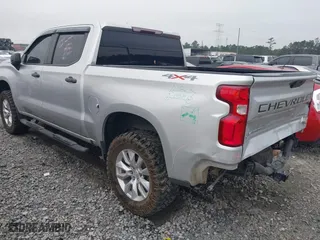 2021 Chevrolet Silverado 1500 Custom with VIN 3GCPYBEK5MG162138, listed as a IAAI auction lot 40882386 with 104,537 mi miles. Bid and sale history available at carsss.com. Image 3.