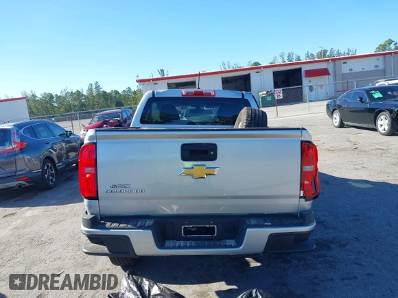 2018 Chevrolet Colorado 2WD Work Truck с VIN 1GCGSBEA0J1283811, выставлен на аукционе IAAI как лот 41834201 с пробегом 75 642 миль миль и . История ставок и продаж доступна на DreamBid. Изображение 16.