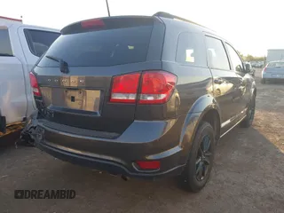 2019 Dodge Journey SE z VIN 3C4PDCBB8KT858387, wystawiony jako IAAI lot #42051620 z przebiegiem 76 126 mil mil oraz . Historia ofert i sprzedaży dostępna na DreamBid. Obrazek 4.