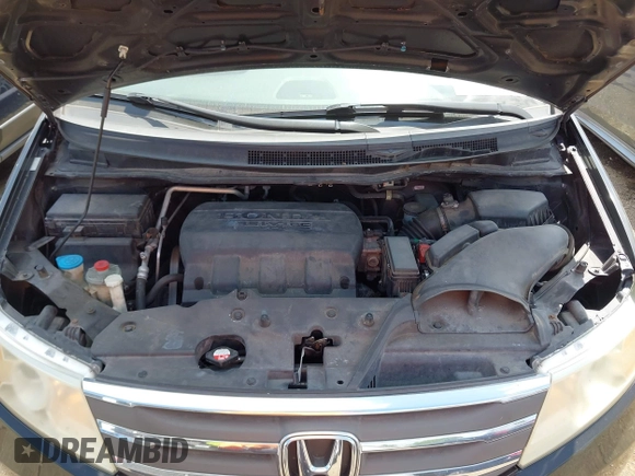 2011 Honda Odyssey EX-L with VIN 5FNRL5H62BB063125, listed as a IAAI auction lot 42562541 with 140,787 mi miles and . Bid and sale history available at DreamBid. Image 10.