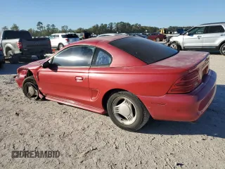 1995 Ford Mustang with VIN 1FALP4047SF208448, listed as a Copart auction lot 80992644 with 328,529 mi miles and Salvage Title. Bid and sale history available at carsss.com. Image 2.